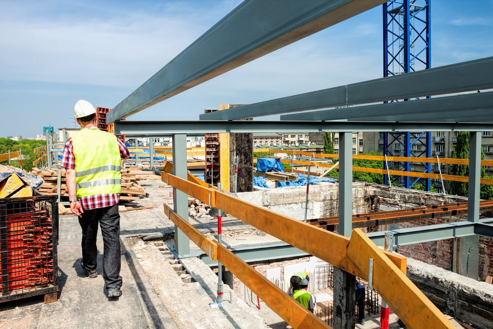 Construction of a modern building and a skyscraper